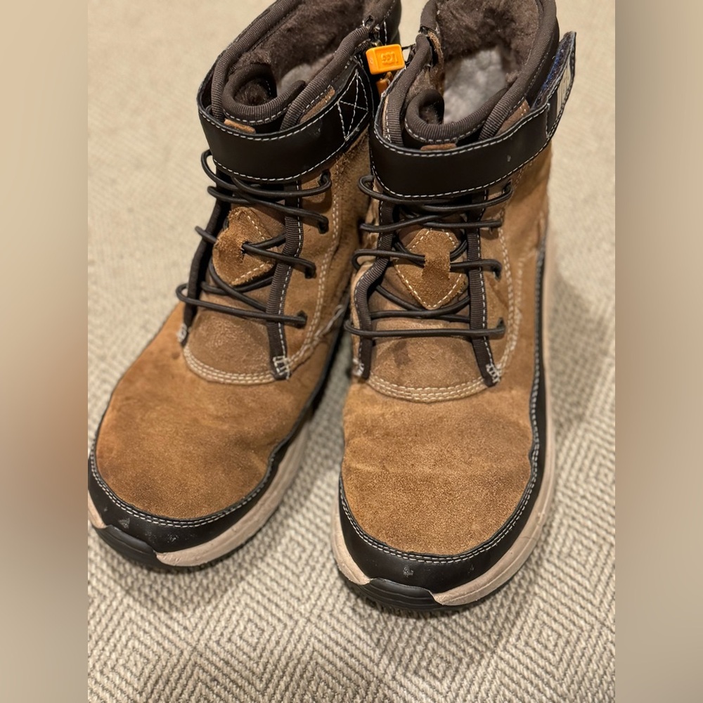 Like new boys Ugg lace up, no tie boot with Velcro.